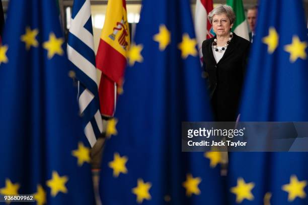 British Prime Minster Theresa May arrives at the Council of the European Union on the final day of the European Council leaders' summit on March 23,...