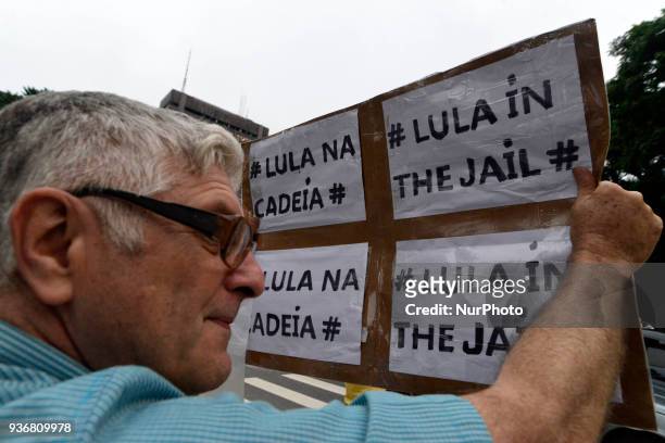 Demonstrators protest in Sao Paulo, Brazil on March 22 while the Supreme Court rules in the Brazilian capital, the Habeas Corpus that could prevent...