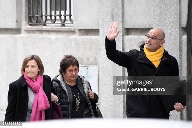 Catalan separatists Carme Forcadell, Dolors Bassa and Raul Romeva arrive at the Supreme Court in Madrid on March 23 summoned by a judge over their...