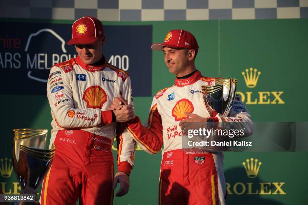 1st place Scott McLaughlin driver of the Shell V-Power Racing Team Ford Falcon FGX celebrates with Fabian Coulthard driver of the Shell V-Power...