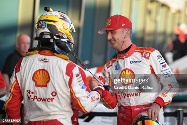 1st place Scott McLaughlin driver of the Shell V-Power Racing Team Ford Falcon FGX celebrates with Fabian Coulthard driver of the Shell V-Power...