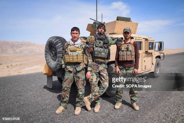 Afghan Commandos in front of a HMMWV, somewhere on the main road in Bolo Bluk district, Farah province. Afghanistans elite military forces the...