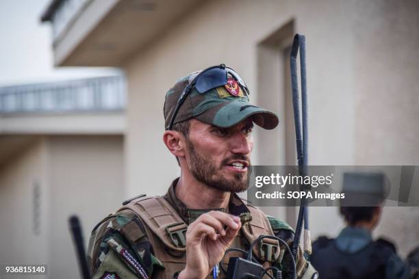 First Lieutenant Zabiullah Shirzoy briefs his Commandos of the 3rd Company of the 2nd Special Operations Brigade for an operation to retake a nearby...