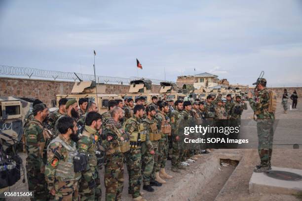 First Lieutenant Zabiullah Shirzoy briefs his Commandos of the 3rd Company of the 2nd Special Operations Brigade for an operation to retake a nearby...