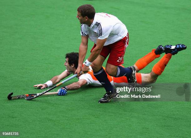 Richard Smith of England watches his shot on goal in the match between England and the Netherlands during day four of the 2009 Hockey Champions...