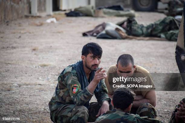 Afghan Commandos seen in a base near Farahrud Bazaar in Bolo Bluk district, Farah province on the morning after a night operation in which they...