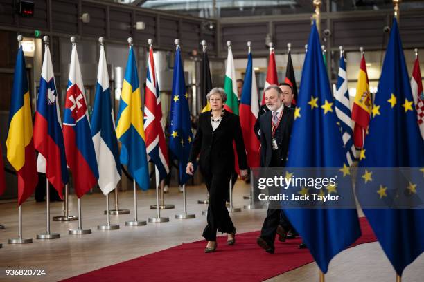 British Prime Minster Theresa May arrives at the Council of the European Union on the final day of the European Council leaders' summit on March 23,...