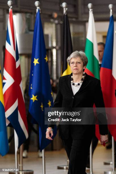 British Prime Minster Theresa May arrives at the Council of the European Union on the final day of the European Council leaders' summit on March 23,...