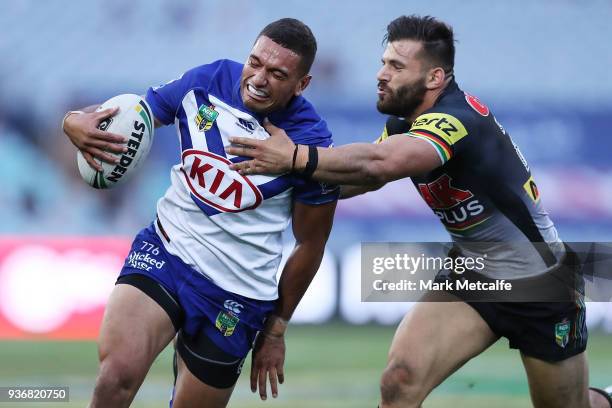 Marcelo Montoya of the Bulldogs takes on Josh Mansour of the Panthers during the round three NRL match between the Bulldogs and the Panthers at ANZ...