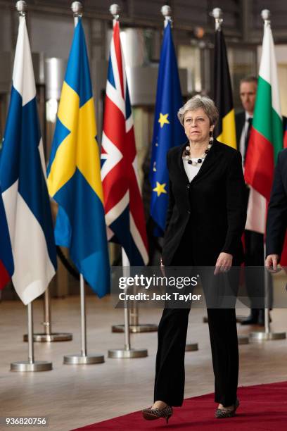 British Prime Minster Theresa May arrives at the Council of the European Union on the final day of the European Council leaders' summit on March 23,...