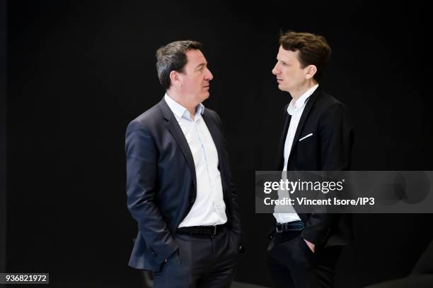 The journalist Francois Pesenti and Damien Bernet , executive vice-president sfr medias, attends the press conference of group managers, on March 20,...