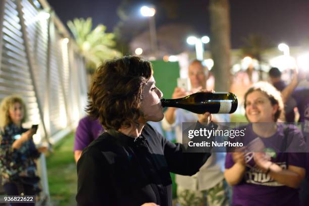 Tamar Zandberg, the new elected leader of Meretz Party, drinks wine as she celebrates with supporters after being elected as the new party leader at...