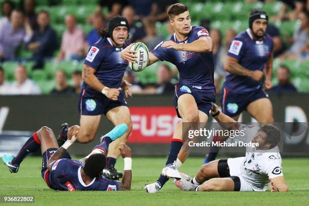 Jack Maddocks of the Rebels runs with the ball during the round six Super Rugby match between the Melbourne Rebels and the Sharks at AAMI Park on...