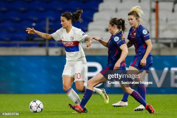 Dzsenifer Marozsan of Olympique Lyon Women, Elise Bussaglia of FC Barcelona Women, Maria Pilar Leon of FC Barcelona Women during the match between...