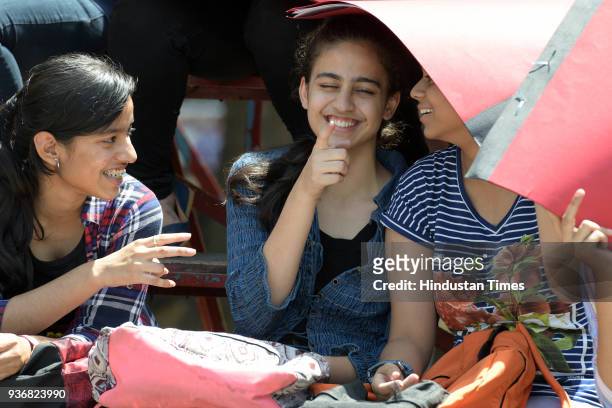 Students greet each other after appearing for the year's last SSC board Exam Paper at Fr Agnel School Vashi, on March 22, 2018 in Mumbai, India.