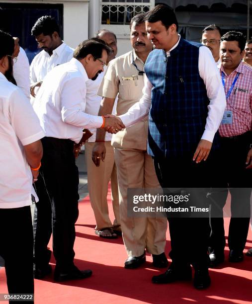 Mayor of Mumbai, Vishwanath Mahadeshwar greets CM Devendra Fadnavis during the budget session at Vidhan Bhavan, on March 22, 2018 in Mumbai, India.