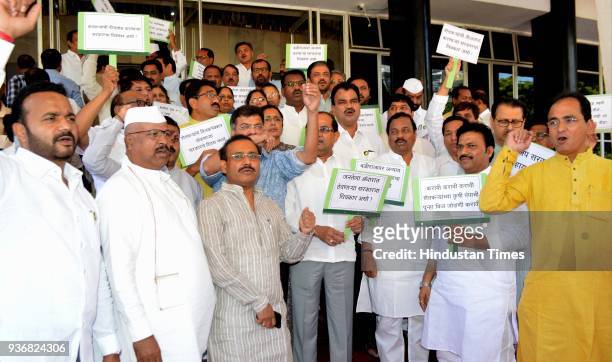 And Congress MLAs protested against the farmer's electricity disconnection during the budget session at Vidhan Bhavan, on March 22, 2018 in Mumbai,...