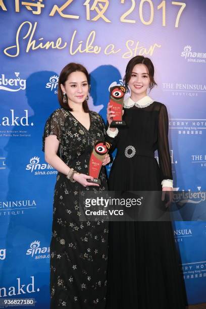 Singer Gillian Chung and singer Charlene Choi attend 2017 Hong Kong Weibo Awards Ceremony on March 22, 2018 in Hong Kong, China.