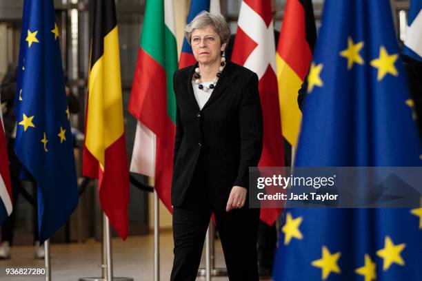 British Prime Minster Theresa May arrives at the Council of the European Union on the final day of the European Council leaders' summit on March 23,...