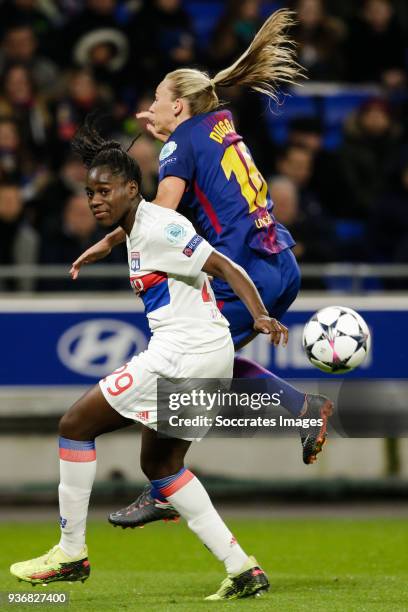 Griedge M'Bock Bathy of Olympique Lyon Women, Toni Duggan of FC Barcelona Women during the match between Olympique Lyon Women v FC Barcelona Women at...