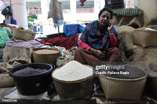 Stallholder displays and sells rice in a marketplace on March 17, 2018 in Imphal, Manipur, India. In this northeastern tip of India in the state of...