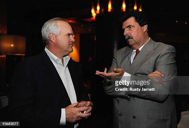 Of Lowe's Robert Niblock and NASCAR president Mike Helton attend the NASCAR Champion's Dinner at DB Brasserie inside the Wynn Las Vegas during Day 1...