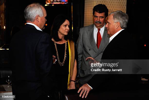 Of Lowe's Robert Niblock, Linda Hendrick, NASCAR president Mike Helton and team owner Rick Hendrick attend the NASCAR Champion's Dinner at DB...