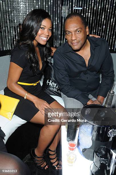 Actress Gabrielle Union , and Hennessy Executive Michael Pellisier attend the Hennessy Black Orlando launch at Rain Ultra Lounge on December 3, 2009...