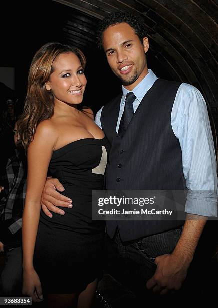 Adrienne Bailon and Quddus attend AXE Lounge at 1OAK on December 2, 2009 in New York City.