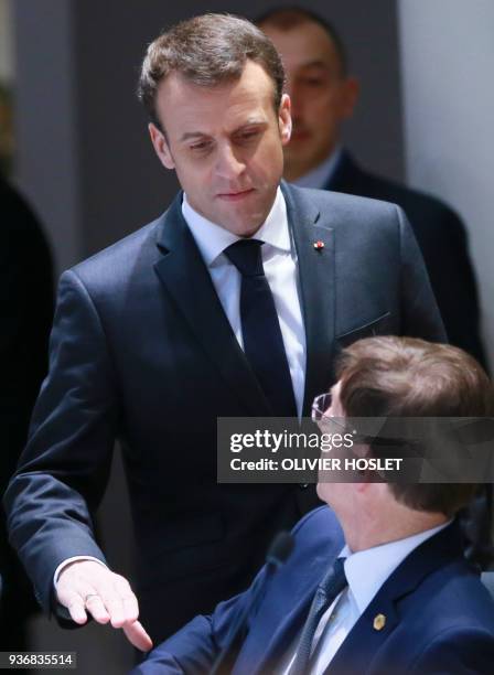 France's President Emmanuel Macron arrives to attend a meeting on the second day of a summit of European Union leaders at the European Council...