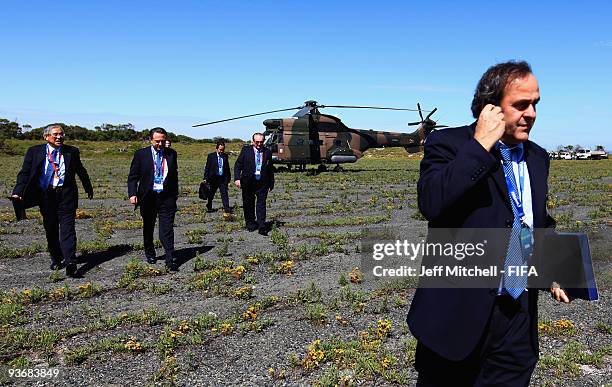President Michel Platini and FIFA Executive Committee members arrive by helicopter for the FIFA Executive Committee Meeting on December 3, 2009 in...