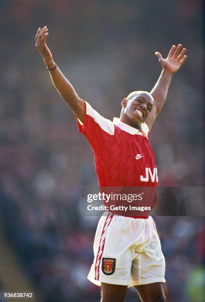 Arsenal striker Ian Wright celebrates a goal during the Premiership match against Wimbledon at Selhurst Prk on October 8, 1994 in London, England.