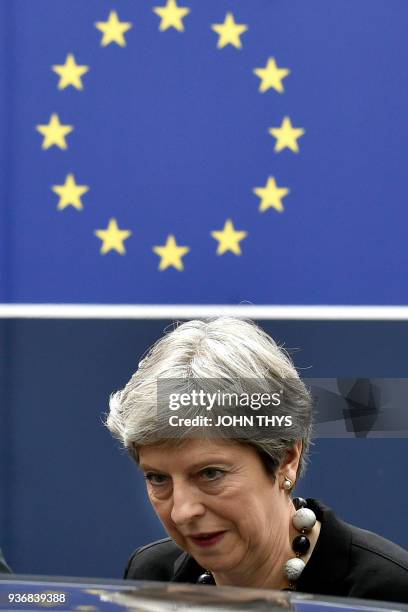 Britain's Prime minister Theresa May leaves on the second day of a summit of European Union leaders at the European Council headquarter in Brussels,...