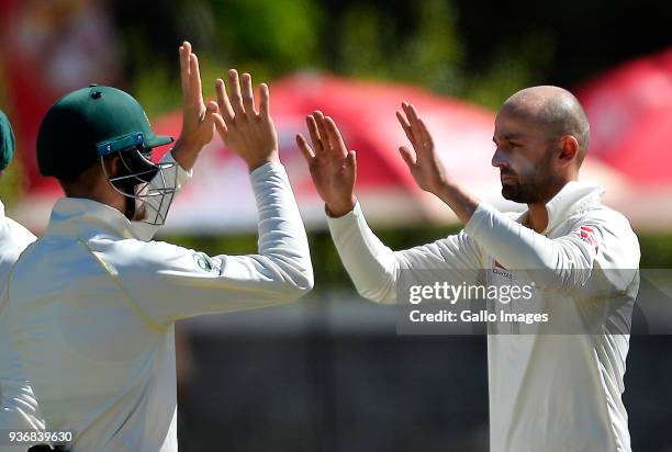 Nathan Lyon of Australia celebrate the wicket of Kagiso Rabada of South Africa during day 2 of the 3rd Sunfoil Test match between South Africa and...