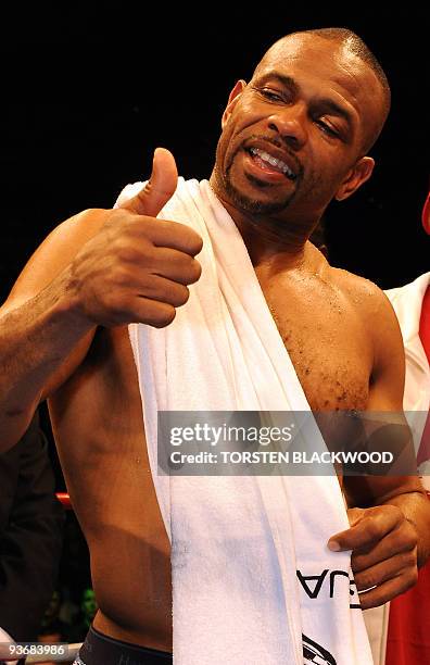 Four-division world champion Roy Jones Jnr of the US gives the 'thumbs-up' to victor and Australian titleholder Danny Green after their IBO...