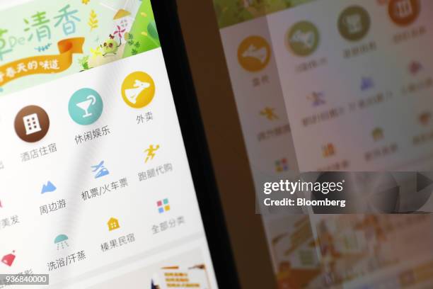 Menu icons are displayed on the Meituan application on an Apple Inc. IPhone in an arranged photograph taken in Hong Kong, China, on Friday, March 23,...