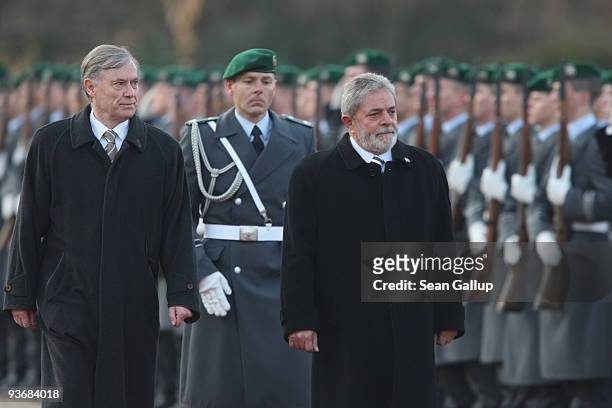 German President Horst Koehler and Brazilian President Luiz Inacio Lula da Silva review a guard of honour upon da Silva's arrival at Bellevue Palace...