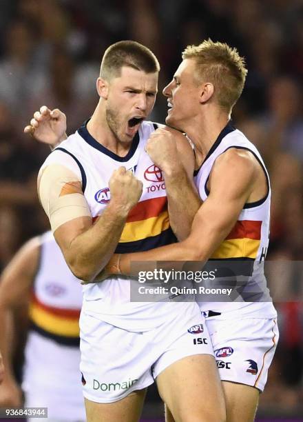 Bryce Gibbs of the Crows celebrates kicking a goal during the round one AFL match between the Essendon Bombers and the Adelaide Crows at Etihad...