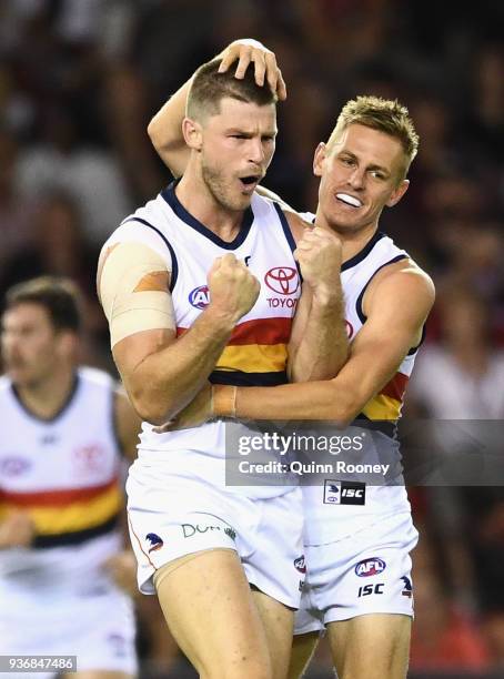 Bryce Gibbs of the Crows celebrates kicking a goal during the round one AFL match between the Essendon Bombers and the Adelaide Crows at Etihad...