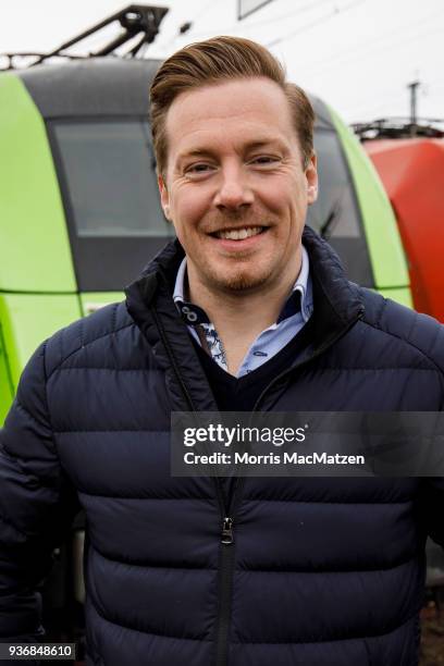 The Co-Founder of Flixbus, Andre Schwaemmlein, poses next to the 'Flixtrain' as its ready to depart for its first Journey from Hamburg to Cologne on...