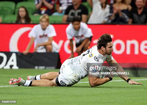 Marius Louw of the Sharks scores a late during the Super Rugby union match between the Melbourne Rebels of Australia and the Coastal Sharks of South...