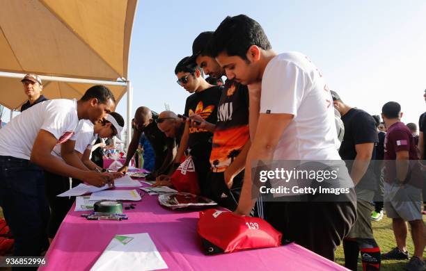 Competitors sign on to take part in the Esrar Obstacle Course Race at Aspire Park on March 23, 2018 in Doha, Qatar.