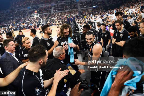 Melbourne players react after a timeout during game three of the Grand Final series between Melbourne United and the Adelaide 36ers at Hisense Arena...