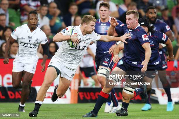 Jean-Luc du Preez of the Sharks pushes off Angus Cottrell of the Rebels during the round six Super Rugby match between the Melbourne Rebels and the...