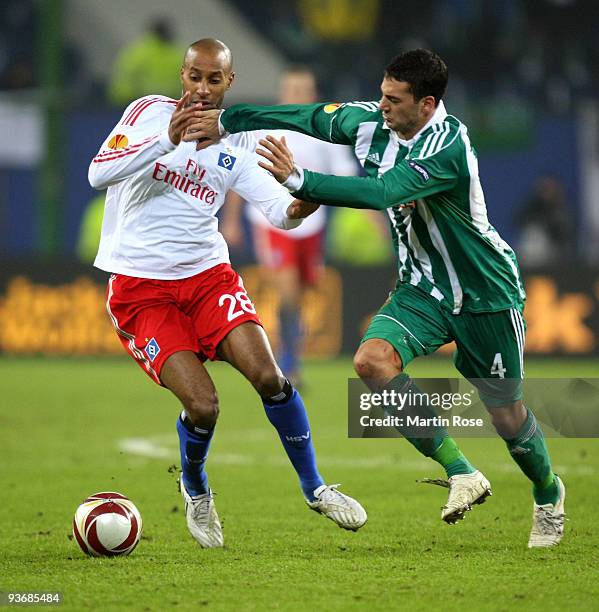 Mickael Tavares of Hamburg and Milan Jovanovic of Wien compete for the ball during the UEFA Europa League Group C match between Hamburger SV and SK...