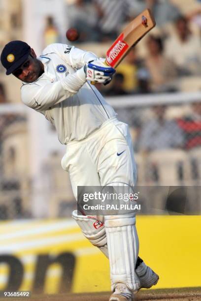 Indian cricketer Virendra Sehwag plays a shot during his unbeaten 284 runs at the end of second day of the third test between India and Sri Lanka in...