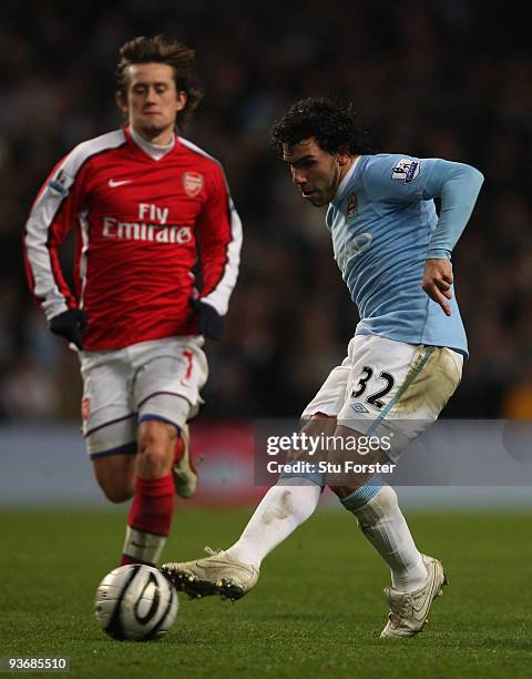 Carlos Tevez of Man City passes the ball during the Carling Cup quarter final match between Manchester City and Arsenal at City of Manchester stadium...