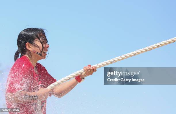 Competitor takes part in the Esrar Obstacle Course Race at Aspire Park on March 23, 2018 in Doha, Qatar.