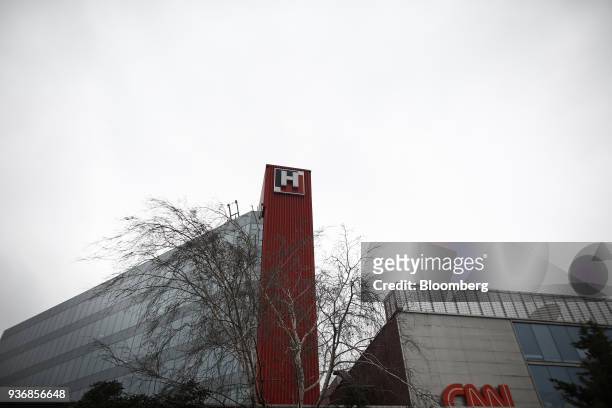 An 'H' logo for Hurriyet newspaper sits on display at the offices beside the broadcasting center for CNN's Turkish affiliate at the Dogan Media...