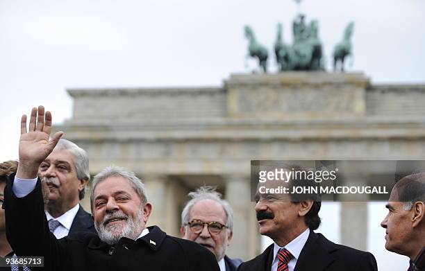 Brazilian President Luiz Inácio Lula da Silva waves to wellwishers as he visits the Brandenburg Gate in Berlin December 3, 2009. Lula earlier met...